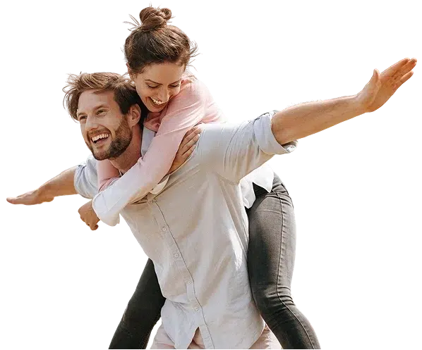 Happy young couple enjoying time together, representing the flexibility and freedom that personal loan options can provide.
